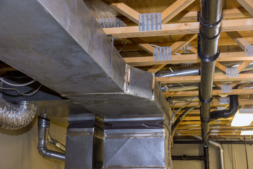 A view of home ductwork replacement, a detailed look at ceiling ducts and ventilation systems needing repair.