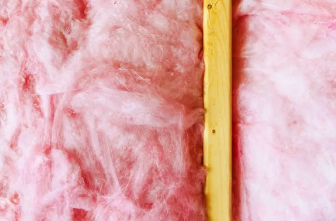 Close-up view of a certain type of insulation in an attic.