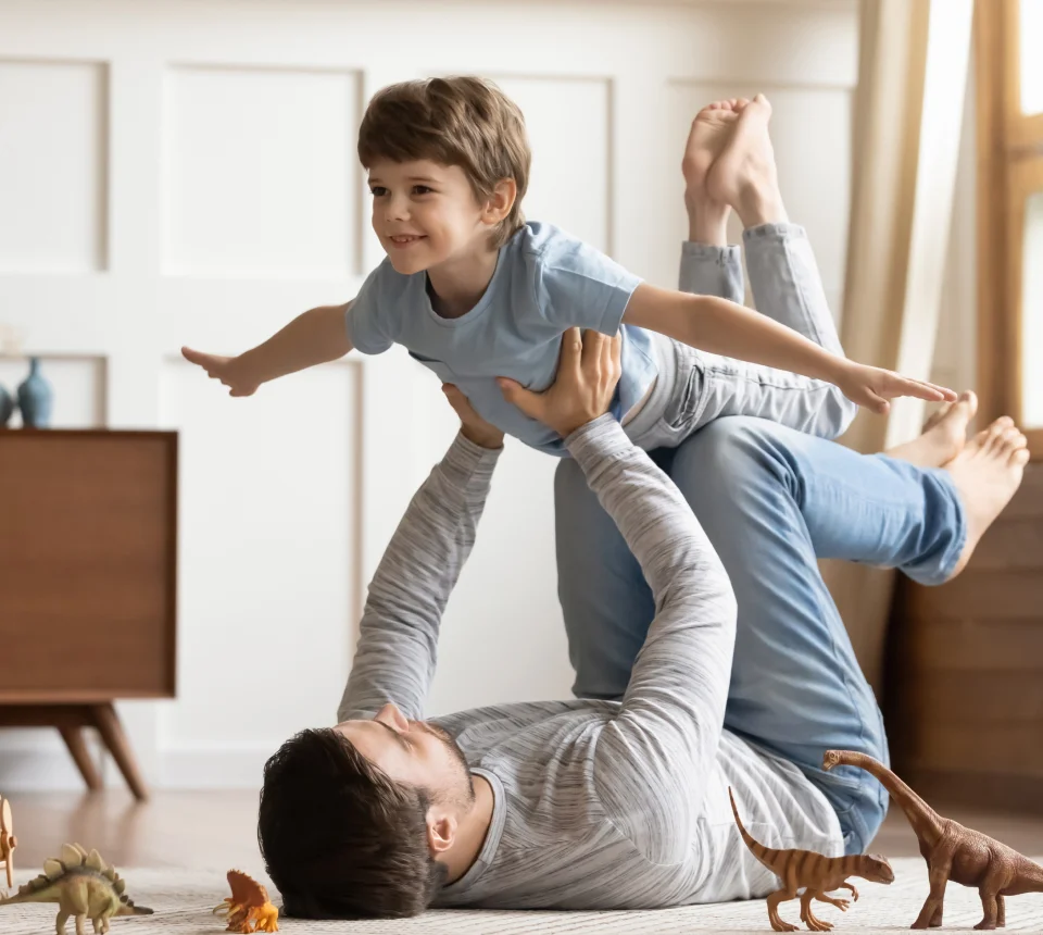 An image of a happy family of four enjoying quality time together after getting the best whole house air purifier.