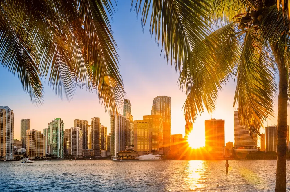 An image of a sunny coastal city skyline symbolizing the need for reliable and affordable HVAC units to keep condos cool and comfortable year-round